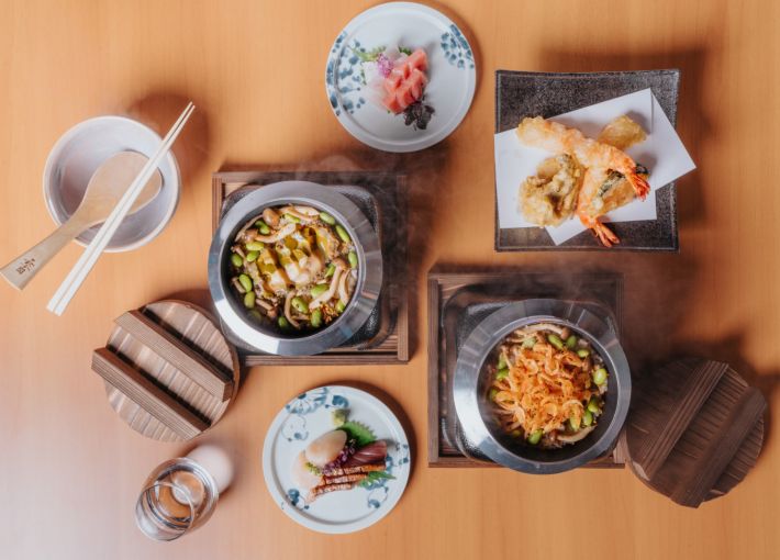 Hanare by Takayama features traditional dishes that highlight seasonal and exquisite ingredients. Their signature dish, the Kamameshi, is a mixed rice cooked in a traditional iron pot and prepared with seasonal produce for a nutritious meal. Hanare by Takayama features traditional dishes that highlight seasonal and exquisite ingredients. Their signature dish, the Kamameshi, is a mixed rice cooked in a traditional iron pot and prepared with seasonal produce for a nutritious meal.