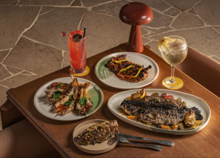 Savor soulful, indulgent bites amid palms & ocean air. Head Chef Mong Zhen Yew crafts wood-fired coastal cuisine with bold, smoky flavors from our Mibrasa grill. 